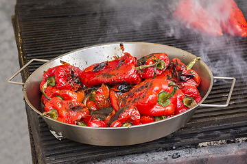 Image showing Grilling red peppers