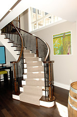Image showing Round staircase to the basement in a new house.