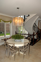 Image showing Dining area in a new house whit staircase.