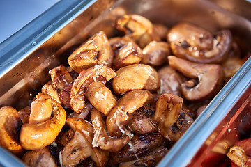 Image showing Cooking mushrooms on the grill