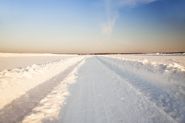 Image showing road to a field. winter  