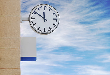 Image showing Clock and plate for information at train station