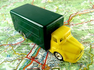 Image showing yellow truck on a map