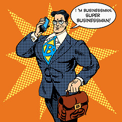 Image showing super businessman answering phone call