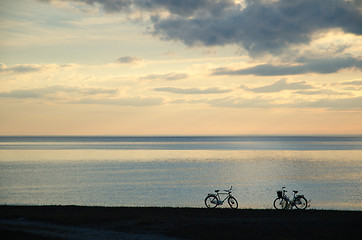 Image showing Silhouettes of two bikes