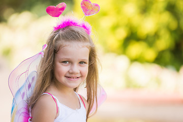 Image showing Happy four-year girl in suit butterfly