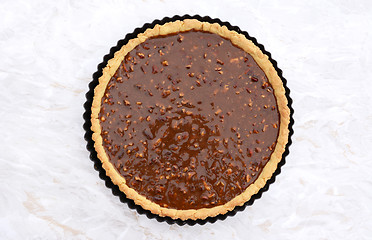 Image showing Unbaked pecan pie ready for the oven 