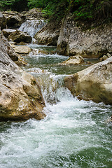 Image showing Waterfall in forest at mountains