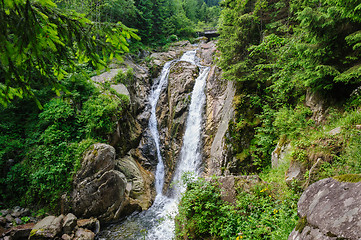 Image showing waterfall in deep forest at mountains