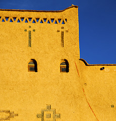 Image showing old brown construction in africa morocco and sky  near the tower