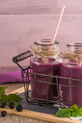 Image showing Fresh red fruits smoothie