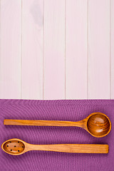 Image showing Kitchenware on purple towel