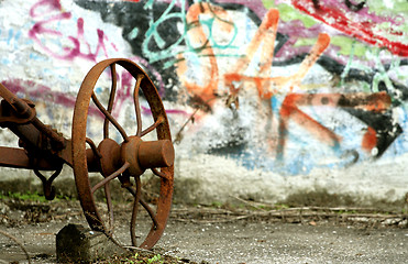 Image showing graffiti with rusty tool