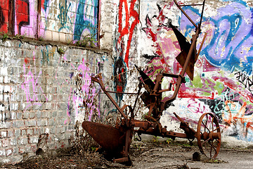 Image showing graffiti with rusty tool