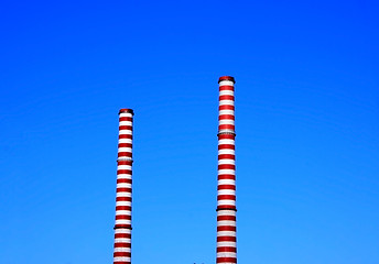 Image showing Two factory towers