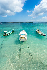 Image showing Small boats on nusa penida beach, Bali Indonesia, pastel color