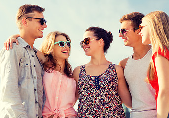 Image showing group of smiling friends in city