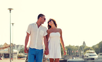 Image showing smiling couple in city