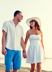 Image showing smiling couple walking outdoors