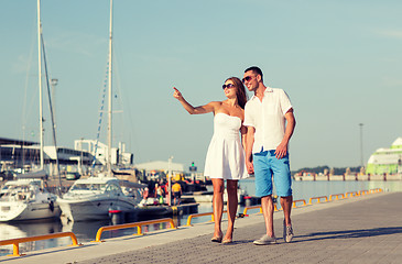 Image showing smiling couple in city