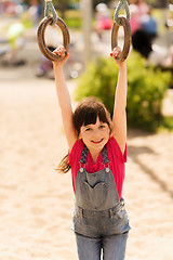 Image showing happy little girl on children playground