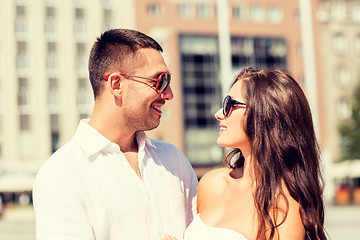 Image showing smiling couple in city