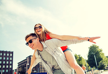 Image showing smiling couple having fun in city