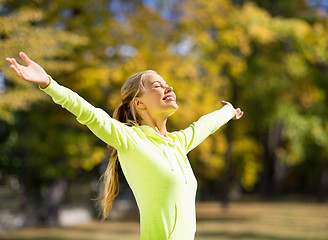 Image showing woman doing sports outdoors