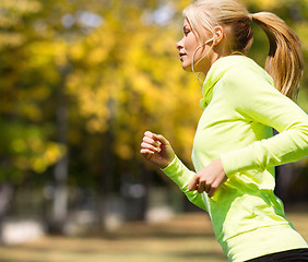 Image showing woman doing running outdoors