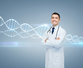 Image showing smiling male doctor in white coat and dna molecule