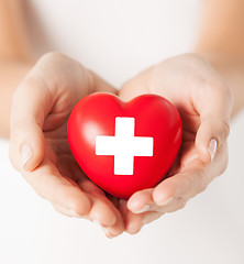 Image showing female hands with red heart