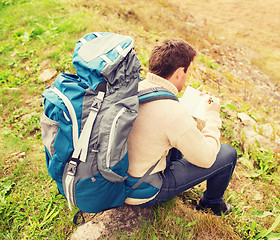 Image showing man with backpack hiking