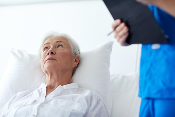 Image showing nurse and senior woman patient at hospital