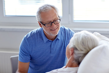 Image showing senior couple meeting at hospital ward