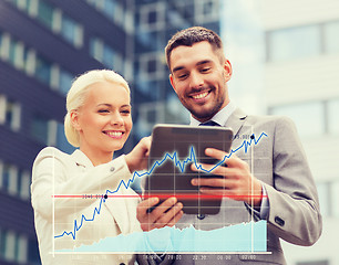 Image showing smiling businessmen with tablet pc outdoors