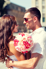 Image showing smiling couple in city