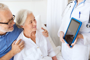 Image showing senior woman and doctor with tablet pc at hospital