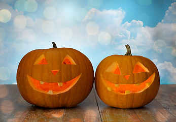 Image showing close up of carved halloween pumpkins on table