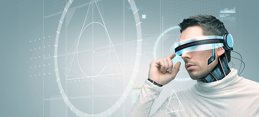 Image showing man with futuristic 3d glasses and sensors