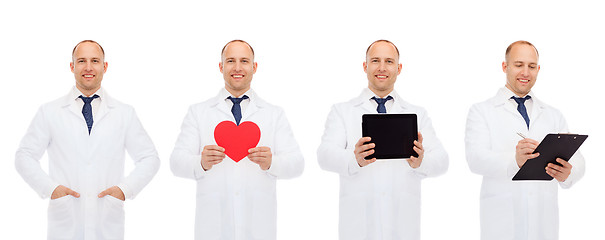 Image showing doctors with red heart, tablet pc and clipboard