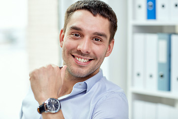 Image showing portrait of smiling businessman in office