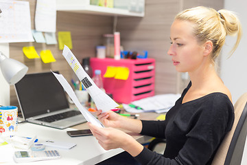 Image showing Businesswoman working on computer in office.