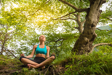 Image showing Woman relaxing in beautiful nature.