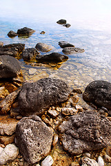 Image showing Rocks in clear water