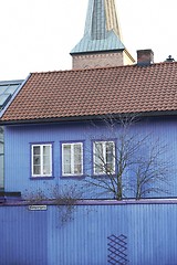 Image showing Blue house and church