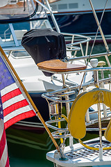 Image showing boat captains seat with american flag