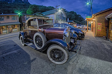 Image showing beautiful classic ford car at night on city street