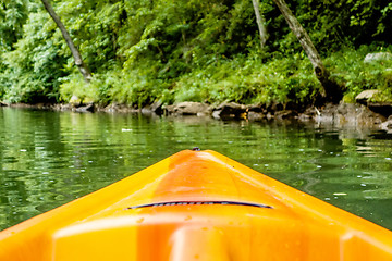 Image showing view from kayak towards mountain river rushing waters