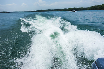 Image showing Waves on lake behind the speed boat  