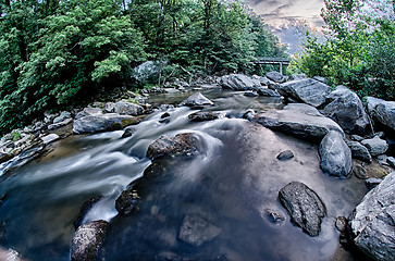 Image showing river stream flowing over rocks